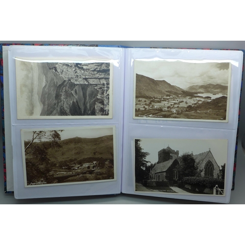 626 - Postcards; a postcard album containing 120 black and white photographic cards