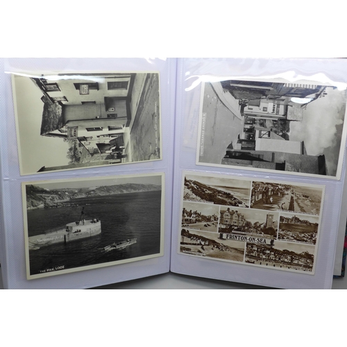 626 - Postcards; a postcard album containing 120 black and white photographic cards