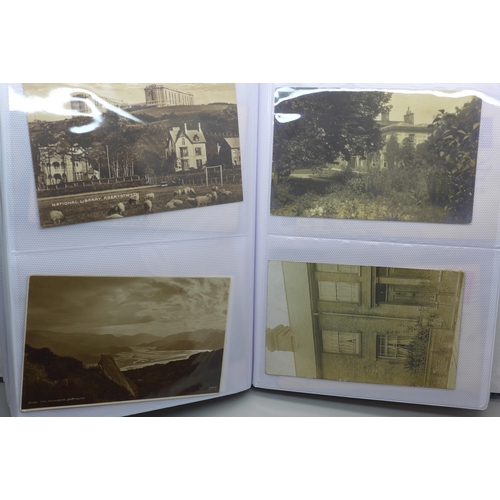 626 - Postcards; a postcard album containing 120 black and white photographic cards