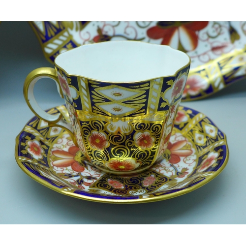 631 - A pair of Royal Crown Derby 2451 pattern plates, cup and saucer and an Imari coffee can and saucer, ... 