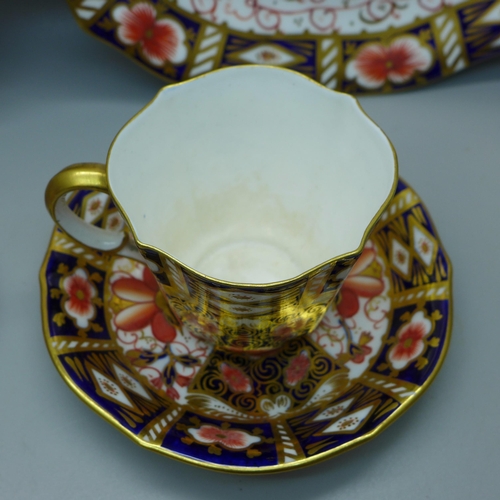 631 - A pair of Royal Crown Derby 2451 pattern plates, cup and saucer and an Imari coffee can and saucer, ... 