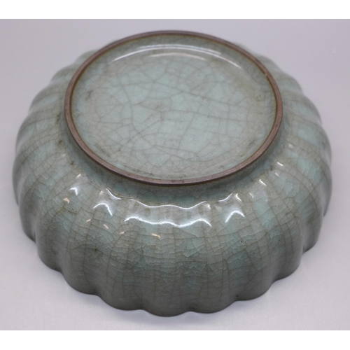 639 - A Celadon wavy edge bowl, 15.5cm