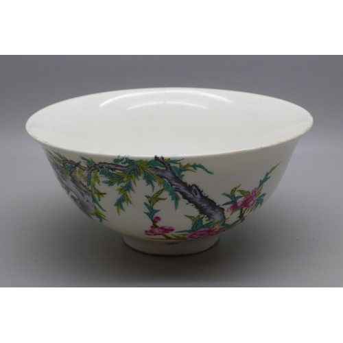 640 - A hand painted Chinese bowl, depicting birds and flowers, six character mark to base, 13.5cm