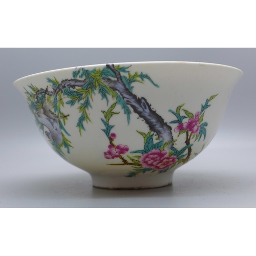 640 - A hand painted Chinese bowl, depicting birds and flowers, six character mark to base, 13.5cm