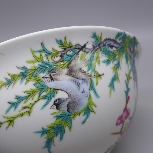 640 - A hand painted Chinese bowl, depicting birds and flowers, six character mark to base, 13.5cm