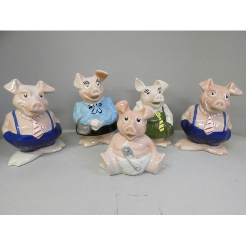 663 - Five Wade Nat West piggy banks, one missing a stopper