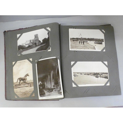 665 - An album of photographic postcards, 1920s, views of Sandringham, military, etc., and an album of cig... 