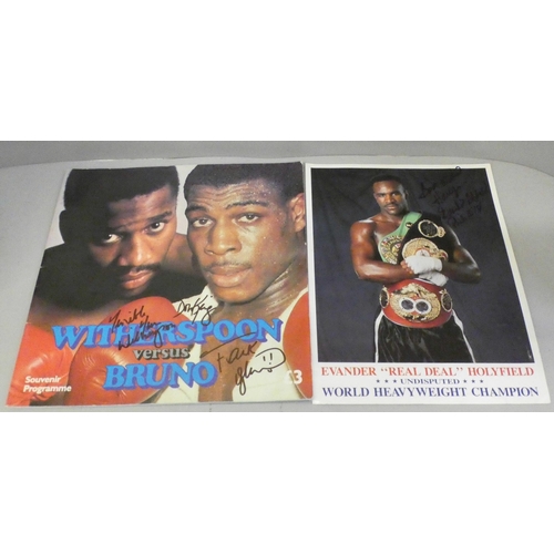 685 - A signed Boxing programme, Don King, Frank Bruno, Tim Witherspoon and an Evander Holyfield signed ph... 