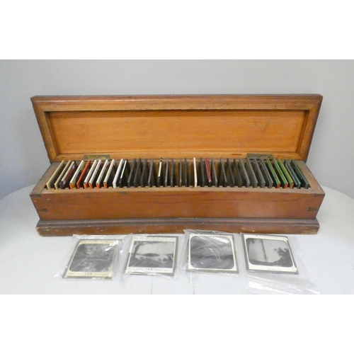 695 - A box of forty Victorian era magic lantern slides