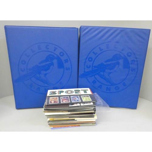 701 - Two albums of Royal Mail presentation packs and loose presentation packs (1970's)