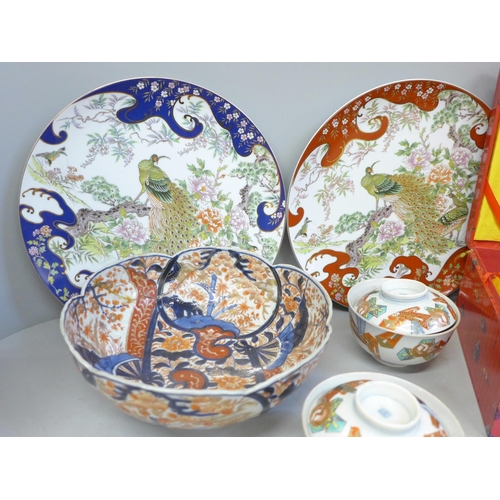 702 - A Chinese terracotta tea service, boxed, a Japanese Imari bowl, a Satsuma dish and rice bowls and co... 