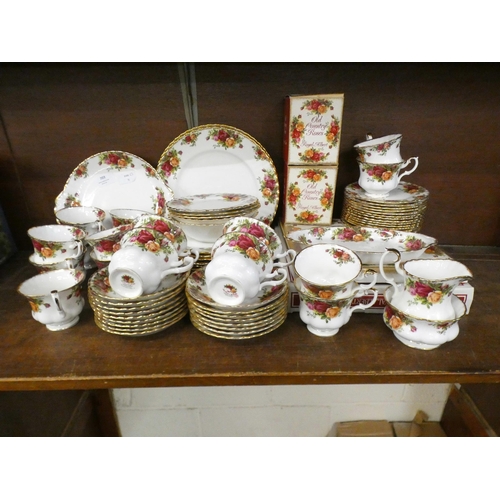 703 - A collection of Royal Albert Old Country Roses china, tea ware, medium plates, two dinner plates, et... 