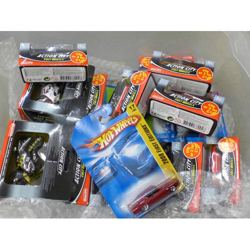 724 - Die-cast model vehicles, Hot Wheels and Action City, boxed