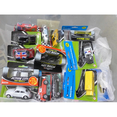 724 - Die-cast model vehicles, Hot Wheels and Action City, boxed