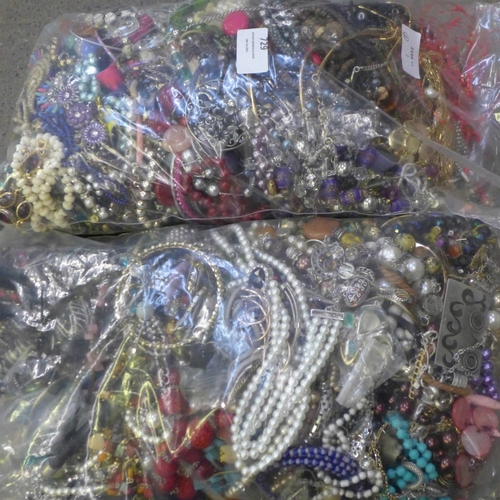 729 - Two large bags of costume jewellery