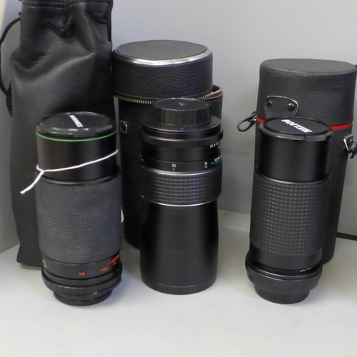 737 - An aluminium camera case and seven lenses