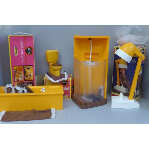 741 - A collection of Sindy furniture, bath, toilet, shower and hairdryer, boxed