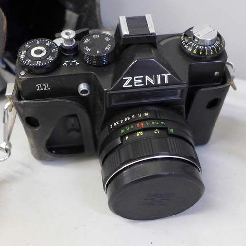 747 - A Zenit 11 camera and a Minolta Hi-Matic F camera