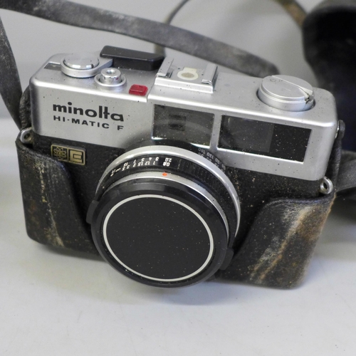 747 - A Zenit 11 camera and a Minolta Hi-Matic F camera