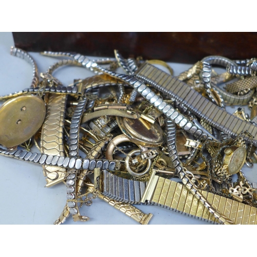 750 - A collection of lady's watch bracelets in a wooden box