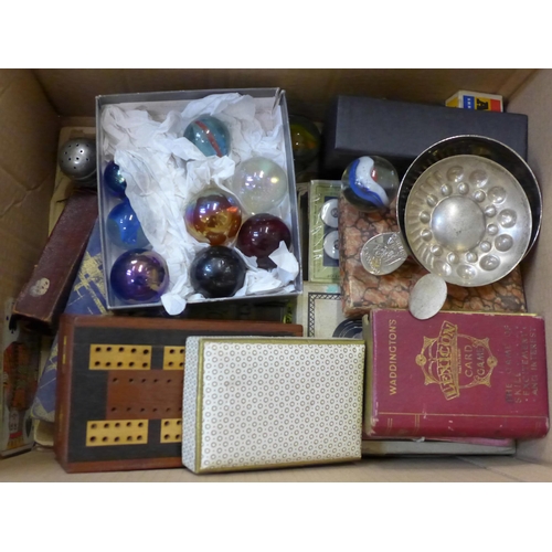 761 - A box of vintage games, marbles and collectables