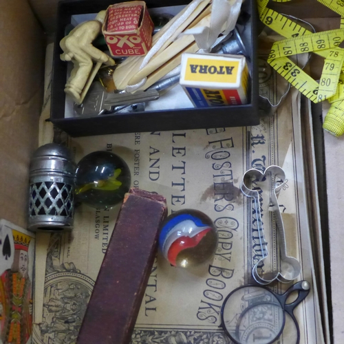 761 - A box of vintage games, marbles and collectables