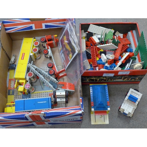 765 - A collection of Lego from 1960s, complete models with instructions from 330 Series; Trucks, Cranes, ... 