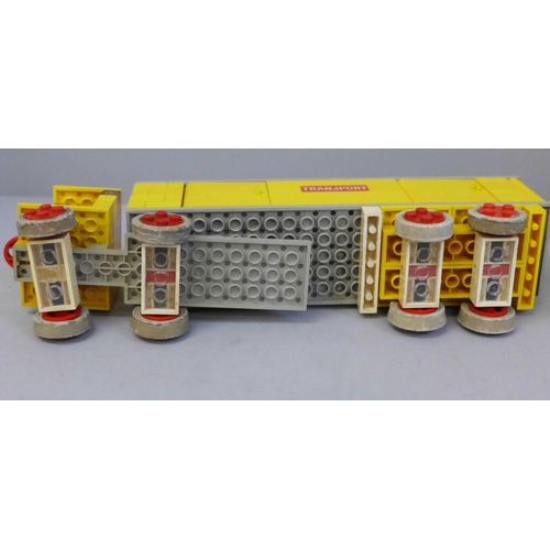 765 - A collection of Lego from 1960s, complete models with instructions from 330 Series; Trucks, Cranes, ... 