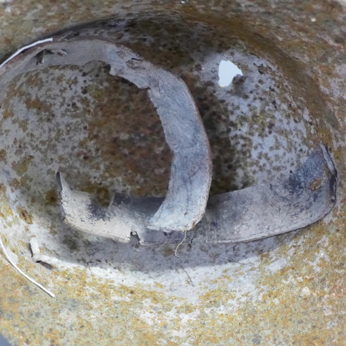 770 - A WWI battle damaged German helmet