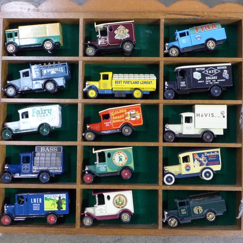 781 - Two display cases containing thirty die-cast model advertising vans