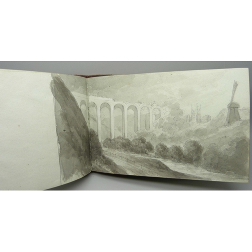 830 - An album of mid 19th Century pencil and watercolour drawings 'en-grisaille', twenty-four, each with ... 