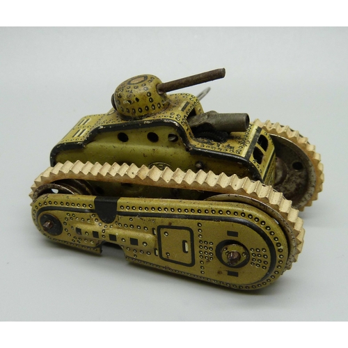 832 - A D.R.G.M. German tin-plate clockwork toy tank, marked Gama, with key, 72mm long