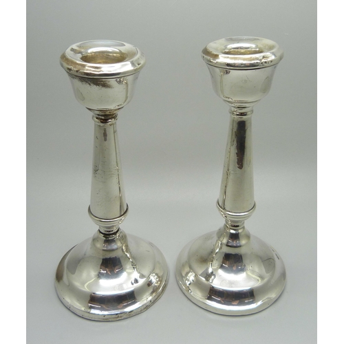 842 - A pair of silver candlesticks, Birmingham 1931, 15.5cm