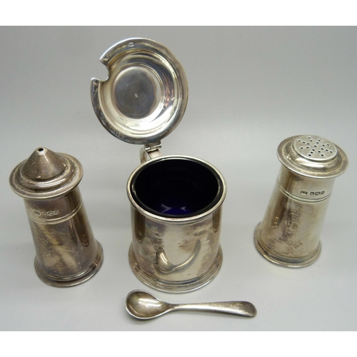 843 - A set of Viners silver condiments; mustard, salt and pepper pots and a mustard spoon, 240g, cased