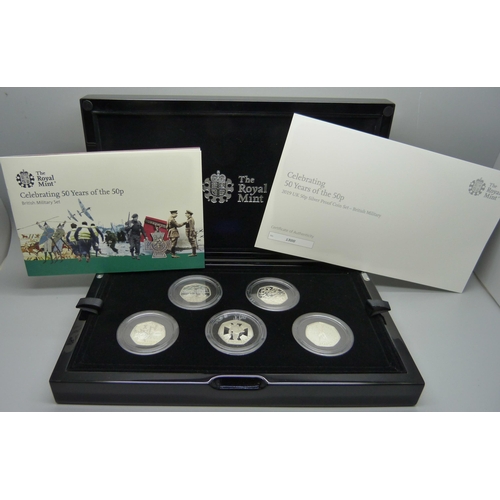 862 - A Royal Mint 2019 Celebrating 50 Years of the 50p Silver Proof Coin Set, British Military Set, seven... 