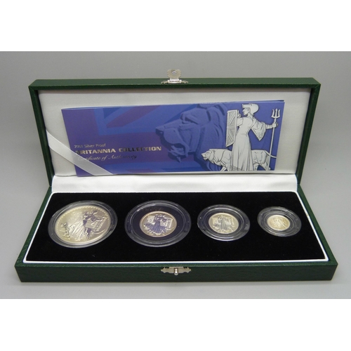 865 - A Royal Mint 2001 Silver Proof Britannia Collection, four coins, boxed, with certificate