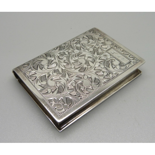 868 - A sterling silver compact in the form of a book, with initials, 51mm x 68mm