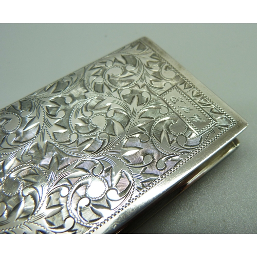 868 - A sterling silver compact in the form of a book, with initials, 51mm x 68mm