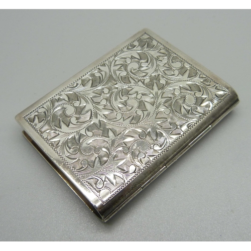 868 - A sterling silver compact in the form of a book, with initials, 51mm x 68mm