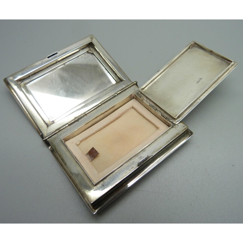 868 - A sterling silver compact in the form of a book, with initials, 51mm x 68mm