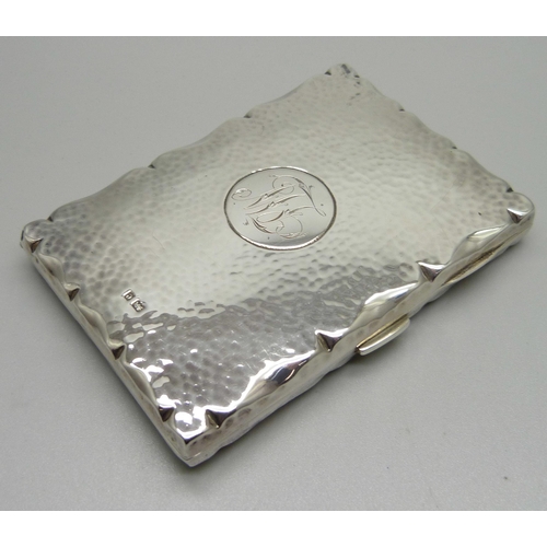 869 - A hammered silver card case, Birmingham 1904, with initials, 70mm x 101mm