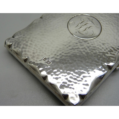 869 - A hammered silver card case, Birmingham 1904, with initials, 70mm x 101mm