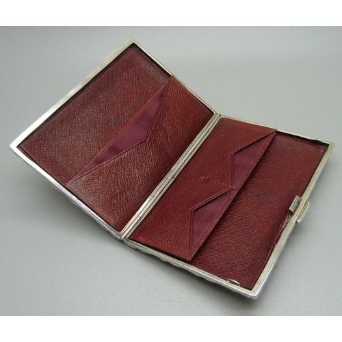 869 - A hammered silver card case, Birmingham 1904, with initials, 70mm x 101mm