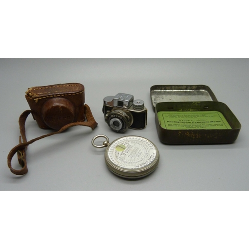 873 - A Mycro Spy camera, Sanwa Co., made in Japan, and a Wynne's Infallible Exposure Meter, with tin and ... 