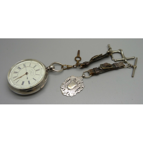 875 - A silver cased centre seconds chronograph pocket watch, Isaac Falk, Manchester, Chester 1888, with a... 