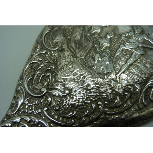 876 - A silver backed hand mirror, Birmingham 1909