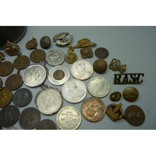 885 - A collection of medallions, coins, badges, buttons, etc.