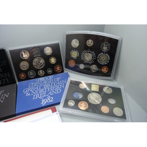 898 - Seven GB proof coin sets, one lacking two coins