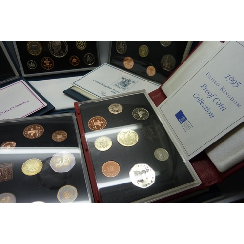 899 - Seven Royal Mint GB proof coin sets