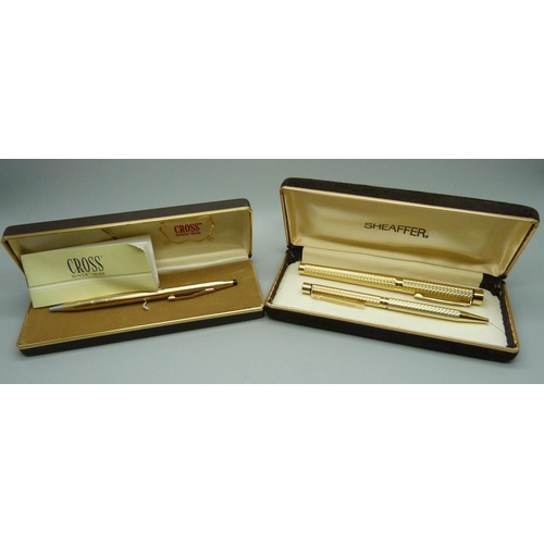 904 - A Sheaffer gold plated pen set, ink pen with 14ct gold nib and a Cross ballpoint pen, both cased